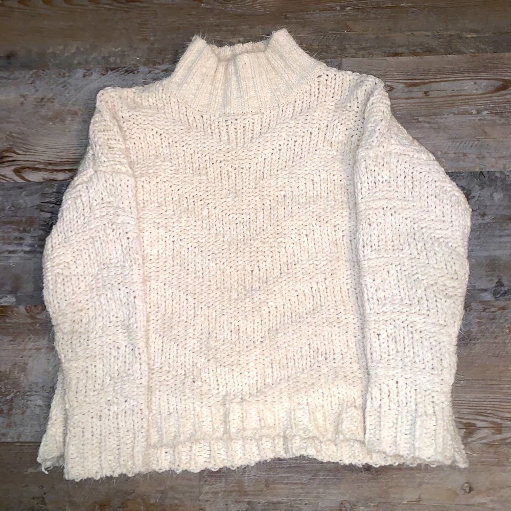 White kinnucan’s fuzzy sweater!